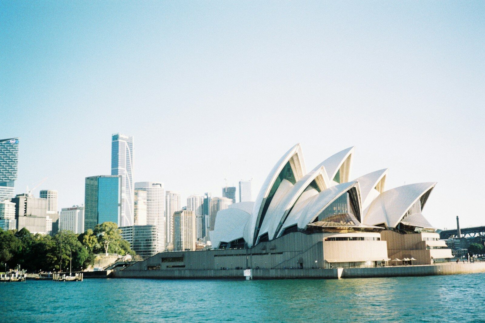 Sydney opera house against the city skyline.