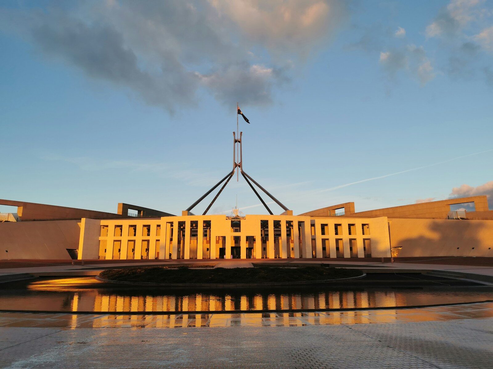 A large building with a flag on top of it
